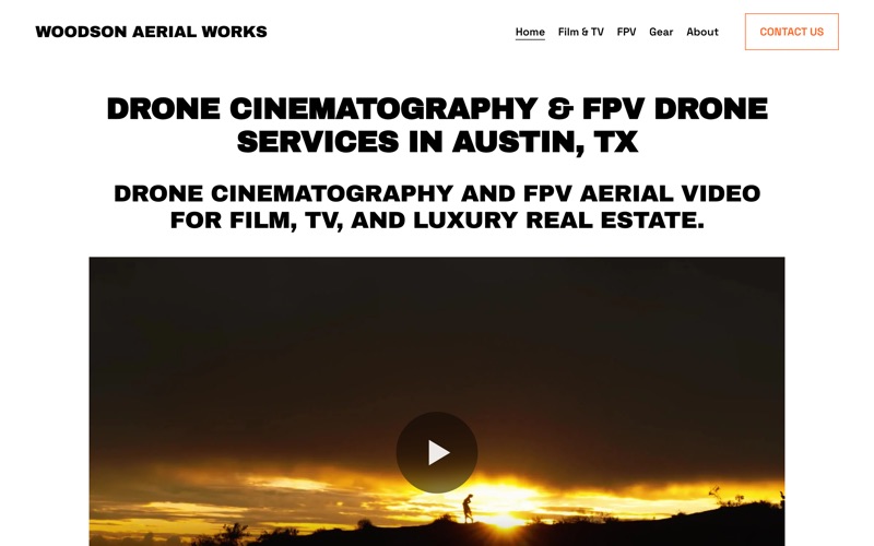 Woodson Aerial Works homepage with its click-to-load showreel.